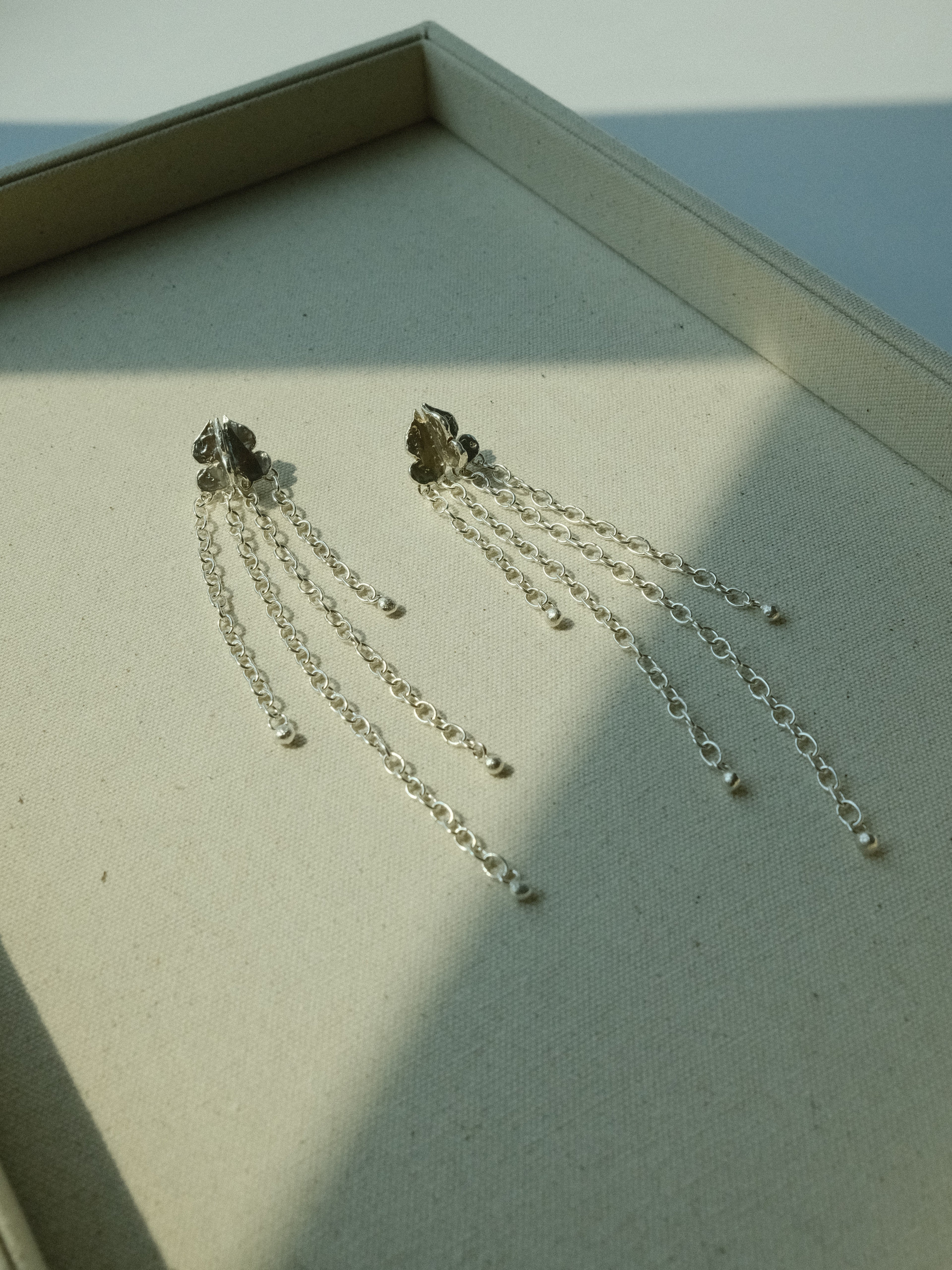 Long Dok Rak Chain Earrings