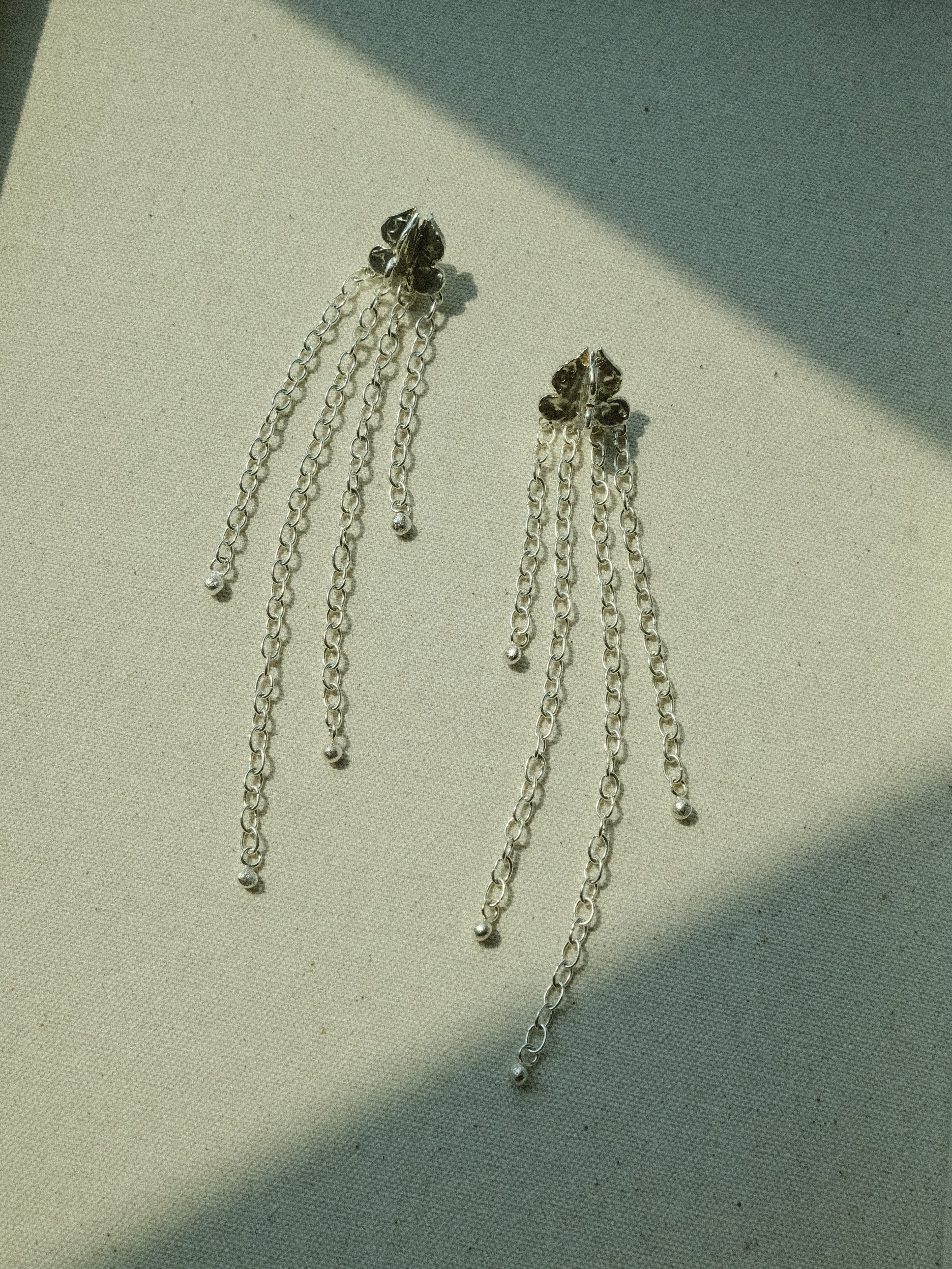 Long Dok Rak Chain Earrings