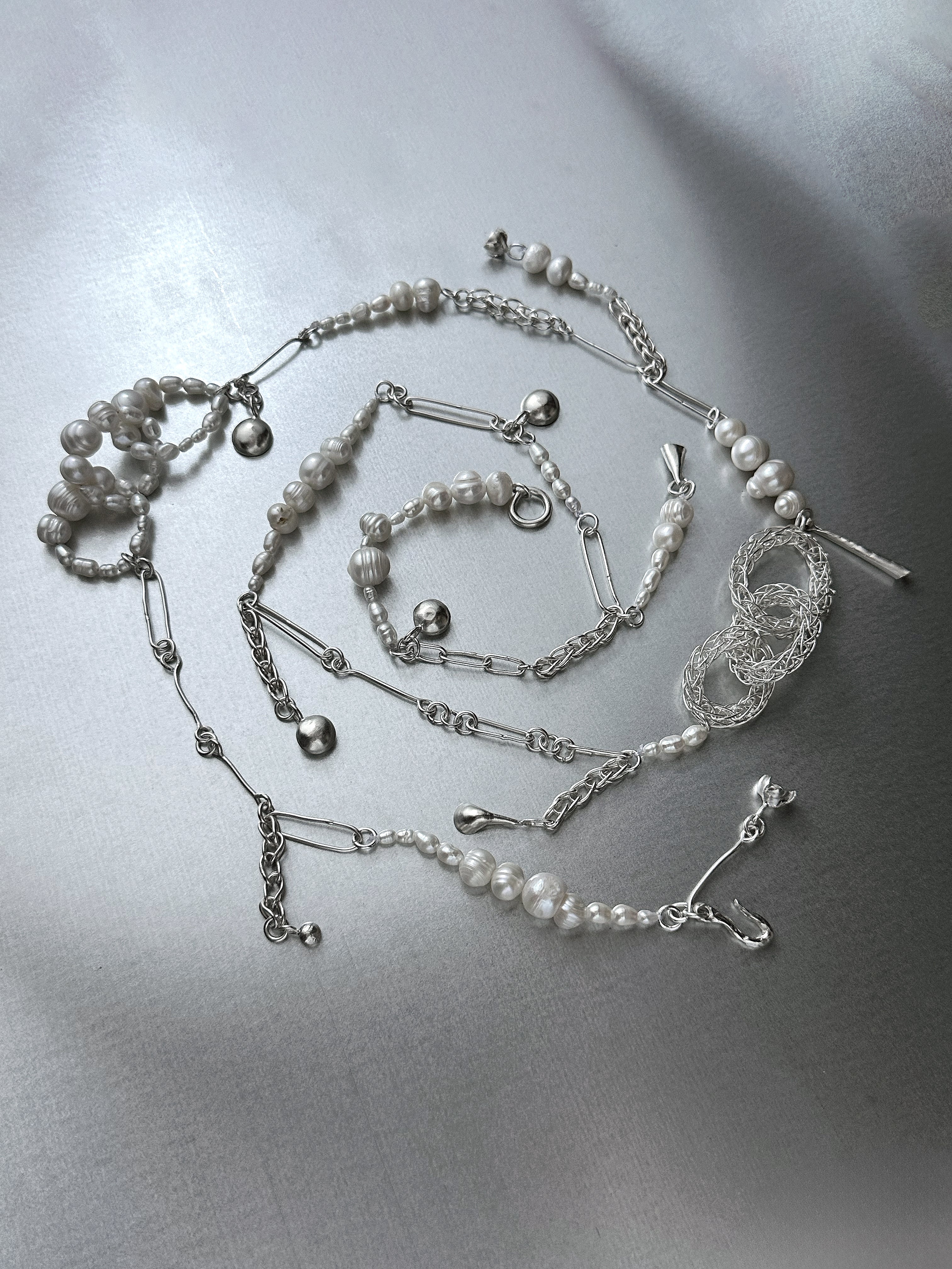 Long Pearl Charm